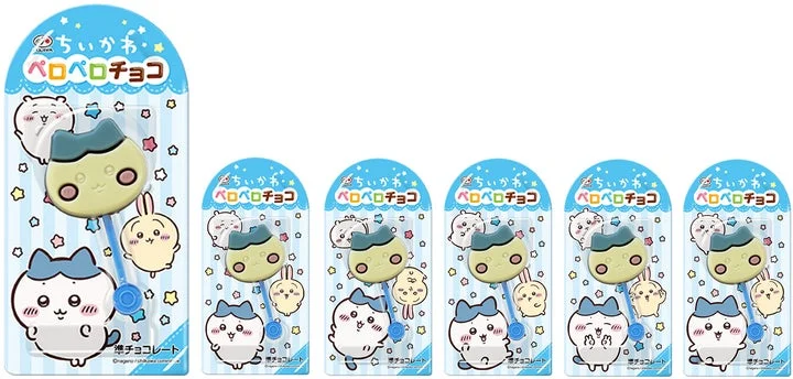 「ハチワレ」の顔をかたどった棒付きチョコレートと、キャラクターがデザインされたパッケージ台紙
