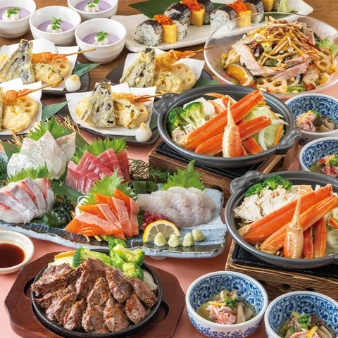 6,500円コースの料理と本ズワイガニの陶板蒸し