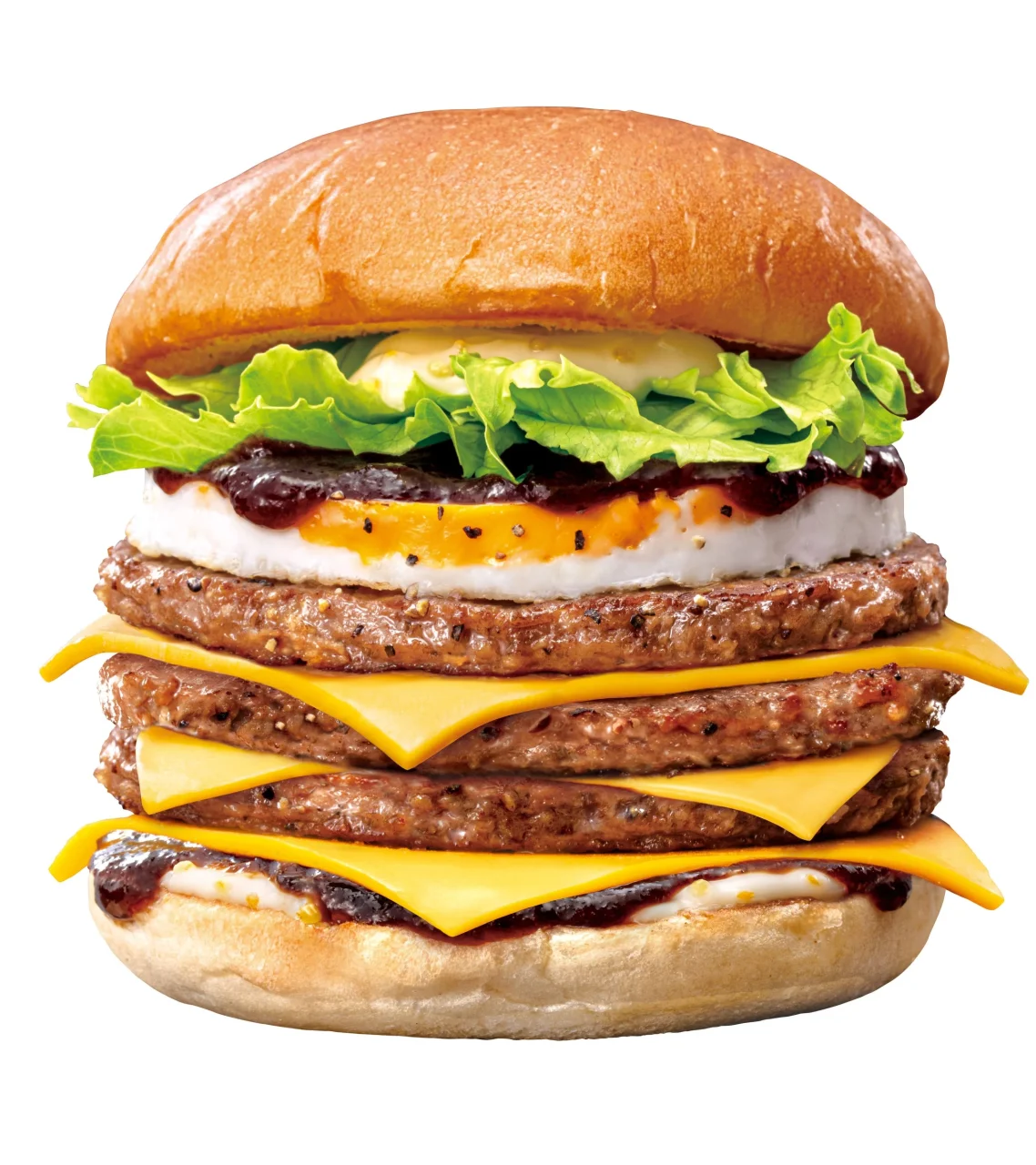 トリプル月見チーズバーガー。パティとチーズを3枚重ね、たまごとソースを挟んだバーガー