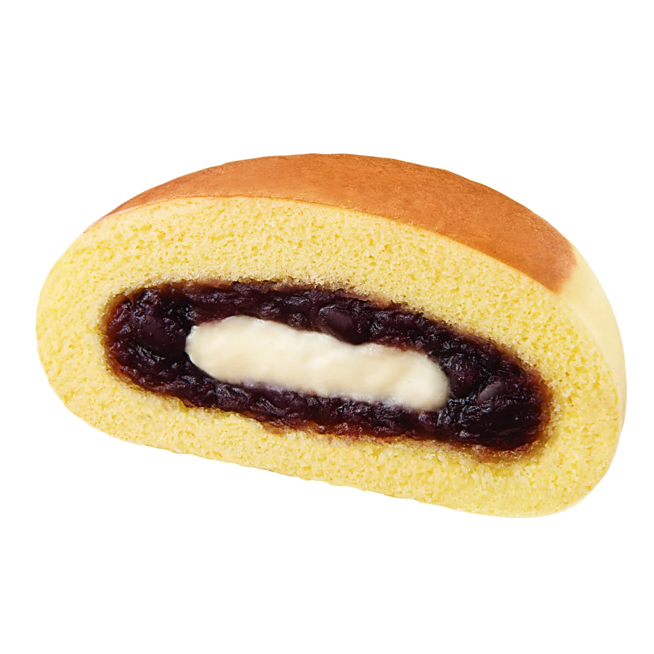 森永製菓監修ホットケーキまん(あんバター)の断面。黄色い生地に粒あんバター