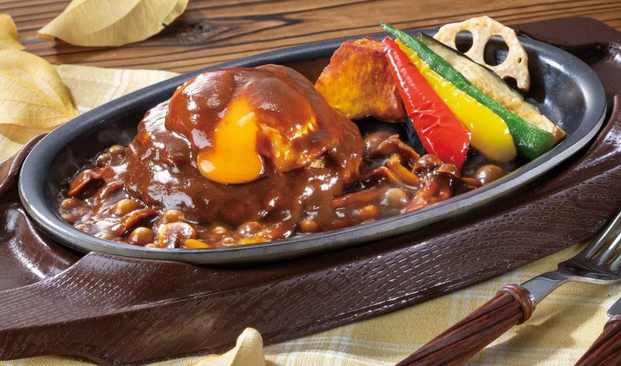 焼き野菜と月見チーズINハンバーグ～きのこデミソース～の鉄板料理