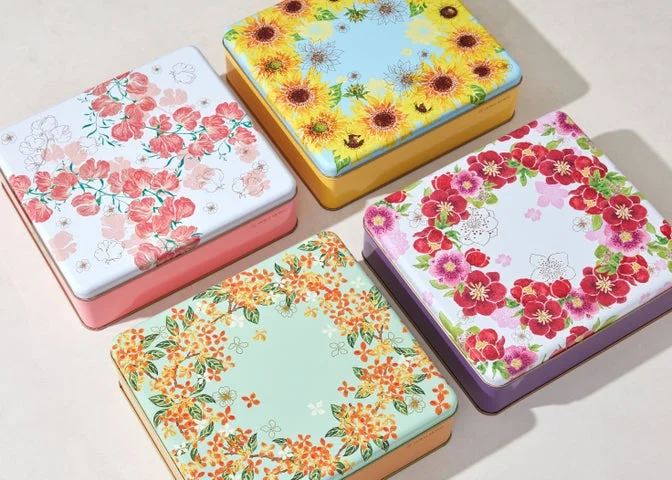 四季折々の花が描かれたカドーシリーズの缶