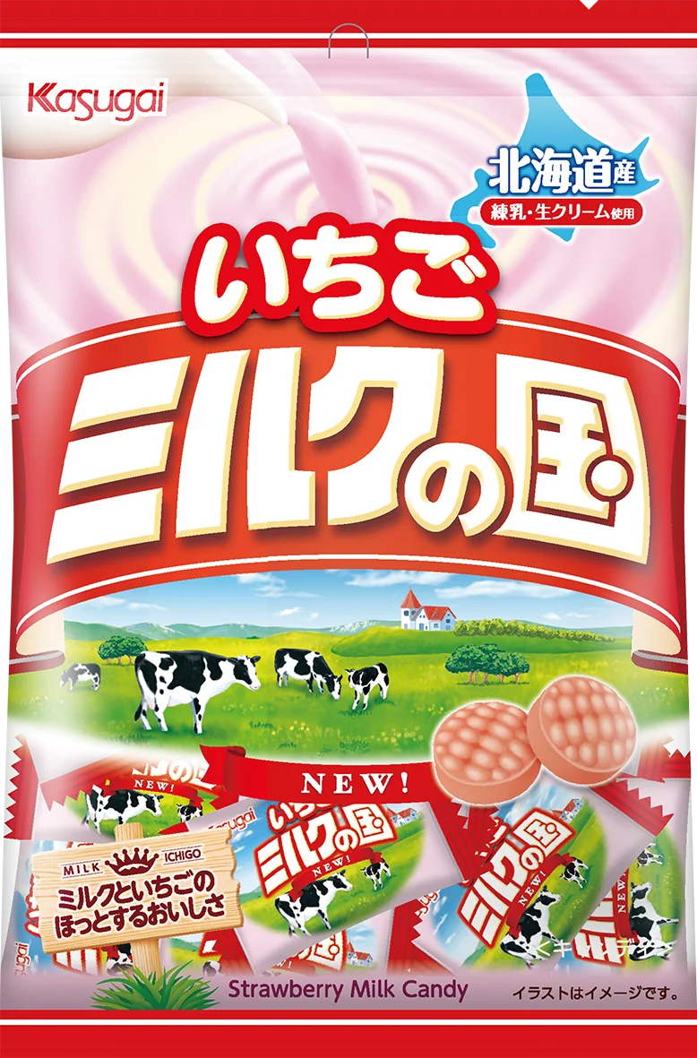 いちごミルクの国のパッケージ。赤い帯に白文字の商品名、牧場と牛のイラスト、個包装キャンディが描かれて