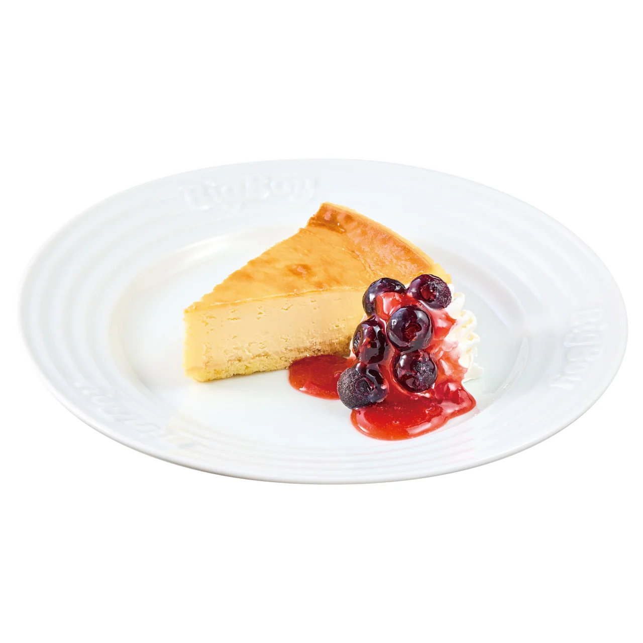 NYチーズケーキ。ブルーベリーとソースを添えたチーズケーキの1枚