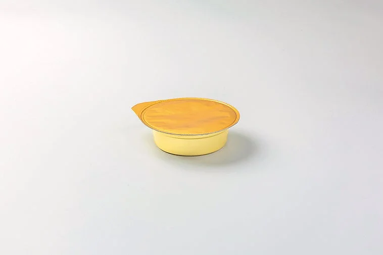 もなさんど（キャラメルプリン味）の個包装されたプリン