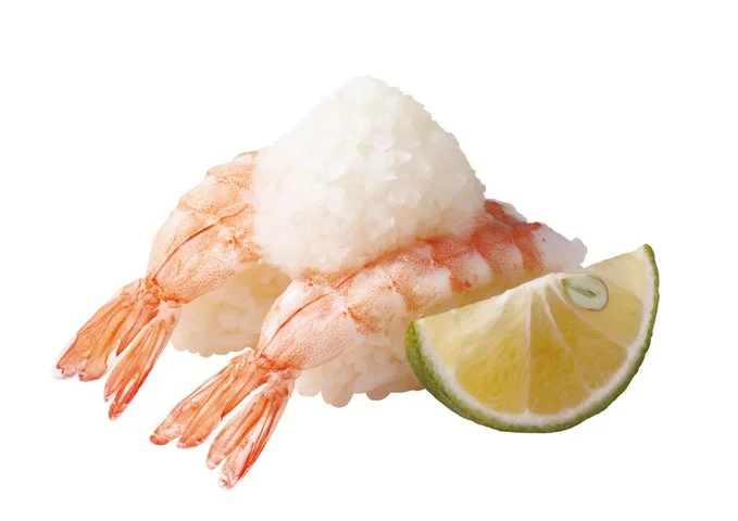 大根おろしを添えたえび握りとカボスのスライス