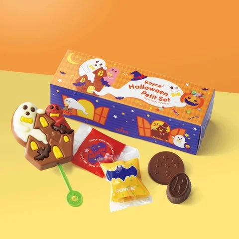 ハロウィン柄の箱と、おばけのポップチョコや個包装チョコが並ぶプチセット