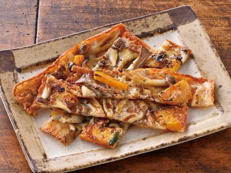 舞茸・しめじ・かぼちゃのチーズ焼。きのこやかぼちゃをチーズで焼き上げた料理