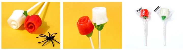 オレンジと白のマリーゴールド型キャンディロリポップと黒いクモの装飾