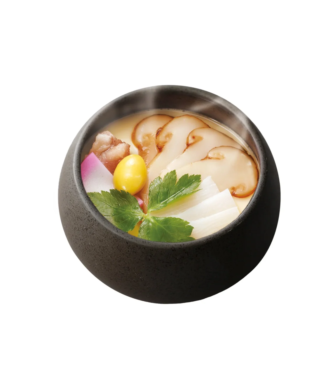 松茸茶碗蒸し。黒い器に茶碗蒸しと松茸、黄身、薬味を添えた外観。