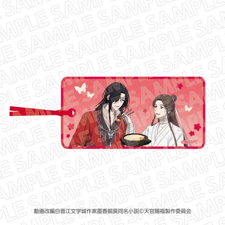 天官賜福コラボブックマーカー。赤い背景に2人のキャラクターと料理が描かれた長方形のイラスト。