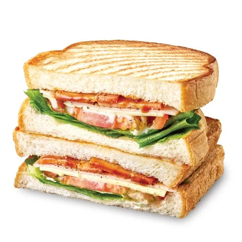 トーストしたパンにレタス・トマト・ハム・ベーコン・チーズを挟んだクラブハウスサンド BLT