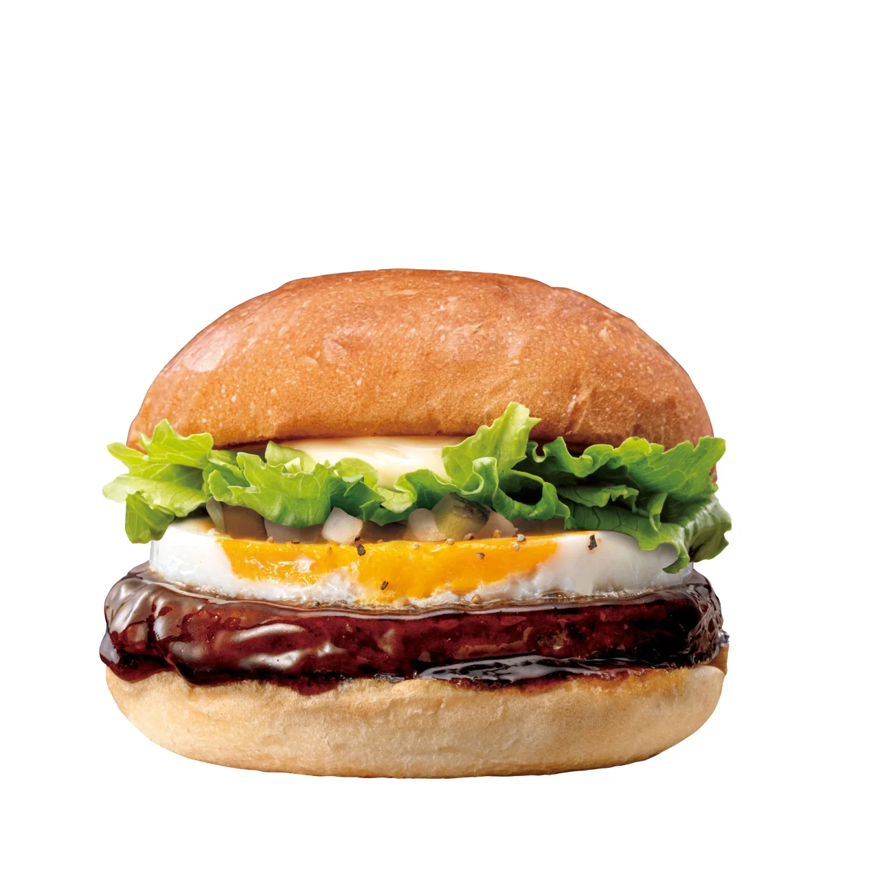 たまてりバーガー。たまご、レタス、ソースをまとったパティを挟んだ外観