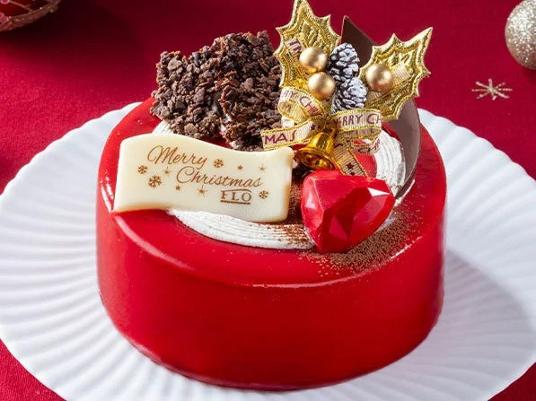 Xmasルージュショコラ。赤いグラッサージュのケーキにMerry Christmasのプレート