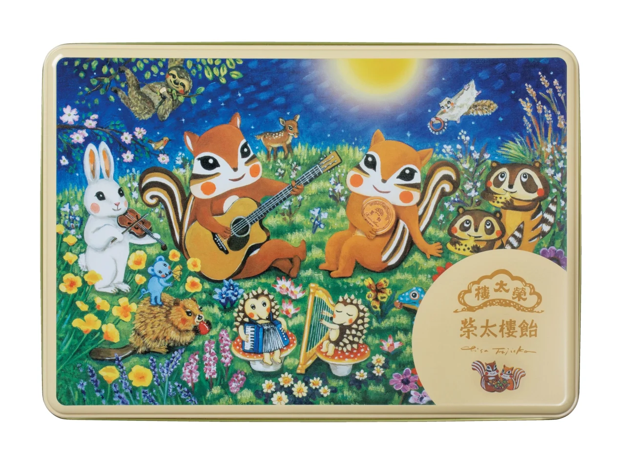 月夜の森で動物たちが演奏する絵柄の榮太樓飴の新デザイン缶