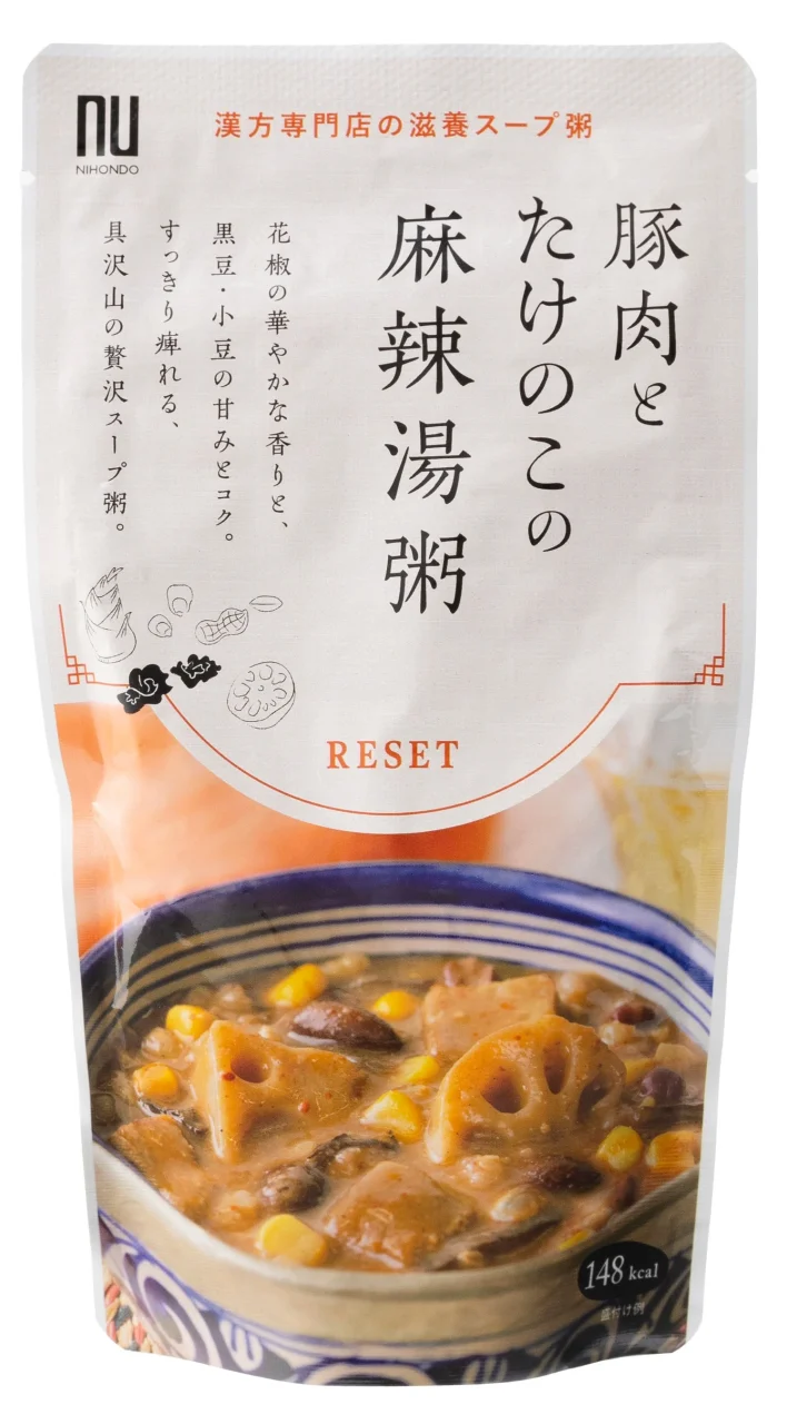 豚肉とたけのこの麻辣湯粥のレトルトパウチ。具沢山のお粥の写真入り