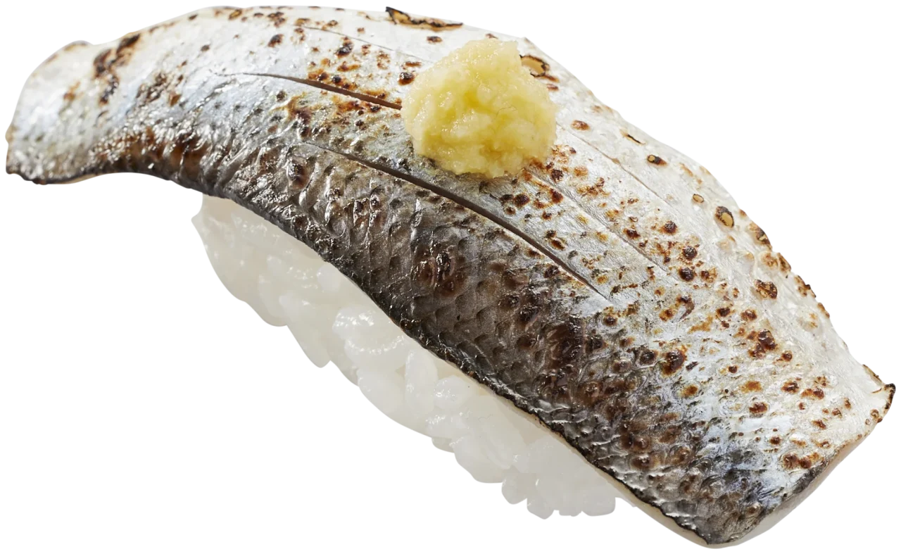 直火で炙った〆こはだ炙りのにぎり。皮目に焦げ目と切れ目、わさび添え