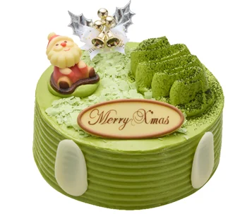お茶屋のバターケーキ。サンタとMerry Xmasのプレートを飾った抹茶色の丸いケーキ