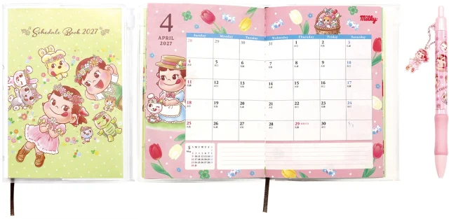 2027年ペコちゃんスケジュール手帳の表紙と4月ページ、チャーム付きボールペン