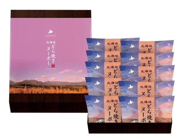 北海道どら焼きヌーボー10個入の紫色の外箱と個包装のどら焼き10個
