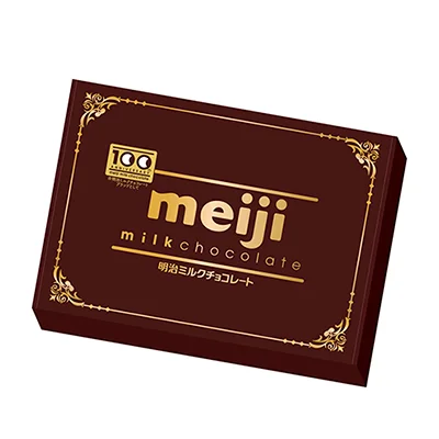 明治ミルクチョコレートの茶色い箱。金色のmeijiロゴと100周年マーク
