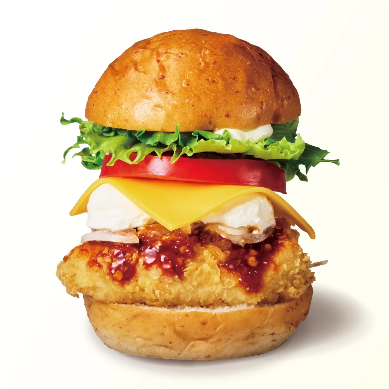 麻辣サワークリームチーズバーガー。レタスとトマト、チーズ入りのバーガー