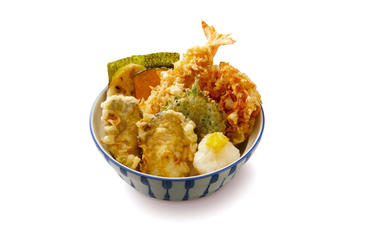 大海老と牡蠣のゆずおろし天丼。青い縞模様の丼に天ぷらと大根おろし