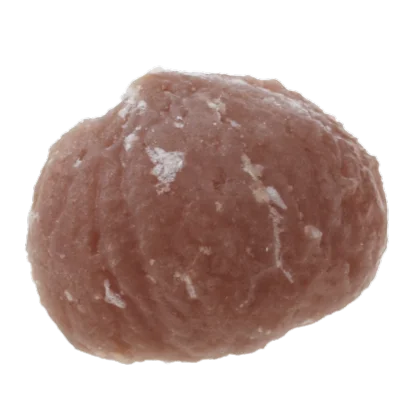 マロン グラッセ。白い粉状の砂糖が付いた茶色い丸い粒